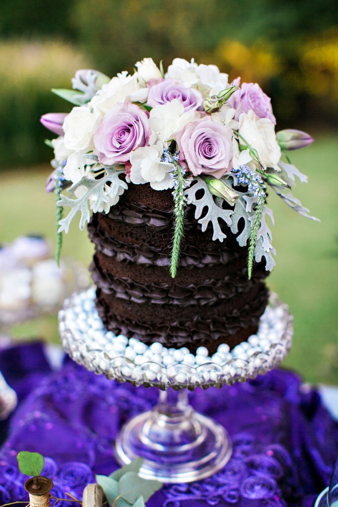 chocolate ganache grooms cake naked silver pedestal topped with fresh flowers