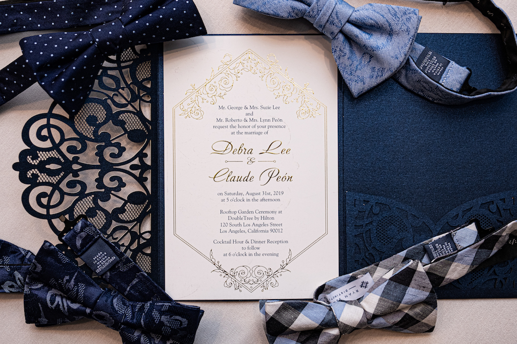 Beautiful navy blue invitation suites with gold accents were sent out to their guests.

Edwin So Photography