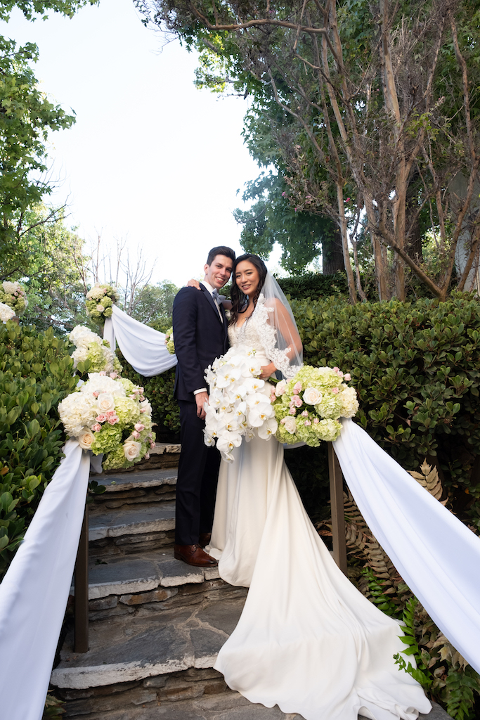 Debra and Claude's romantic photos on the stairs leading up to their ceremony in the garden.

Edwin So Photography