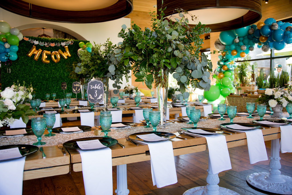 The reception room was dressed in shades of turquoise and green, with the venue's natural earth tones creating a beautiful aesthetic.

Trista Maja Photography