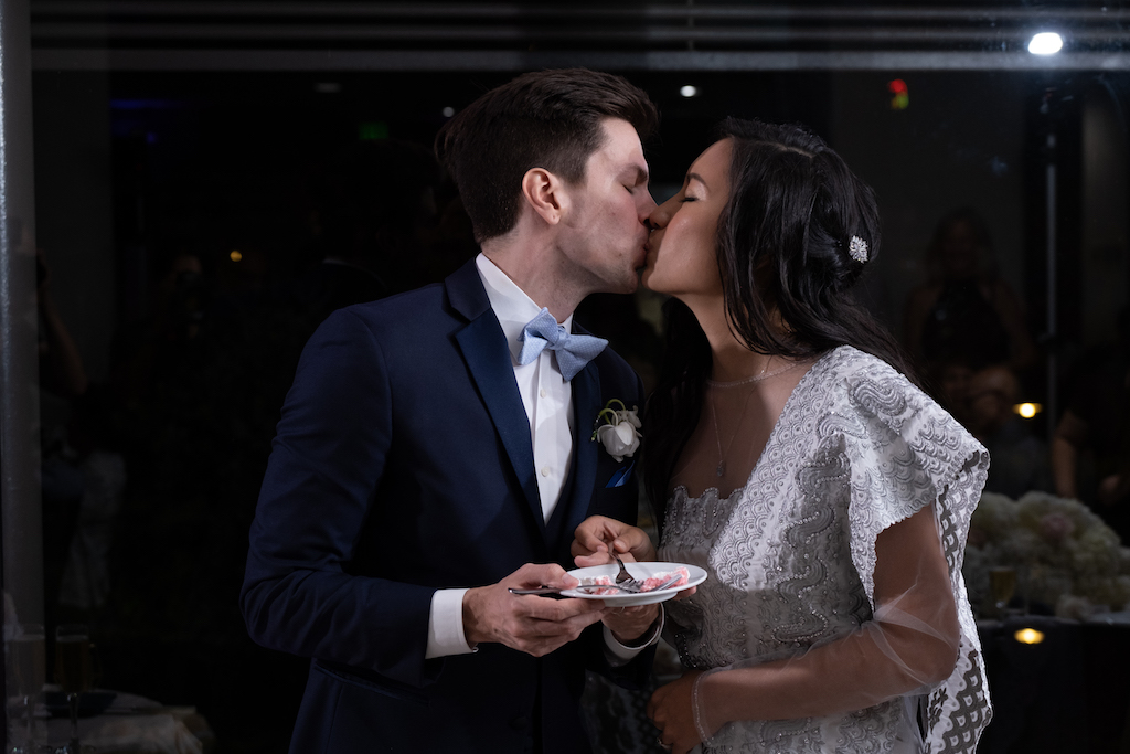 A sweet kiss shared by the couple after their cake cutting!

Edwin So Photography