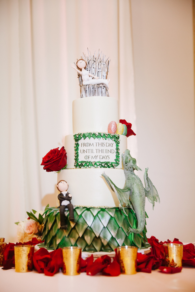 An amazing cake featuring fondant characters, an iron throne, and a dragon! With detailed fondant eggs and scales.

Photo by GC Masterpiece