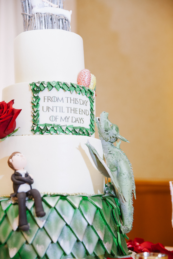 An amazing cake featuring fondant characters, an iron throne, and a dragon! With detailed fondant eggs and scales.

Photo by GC Masterpiece