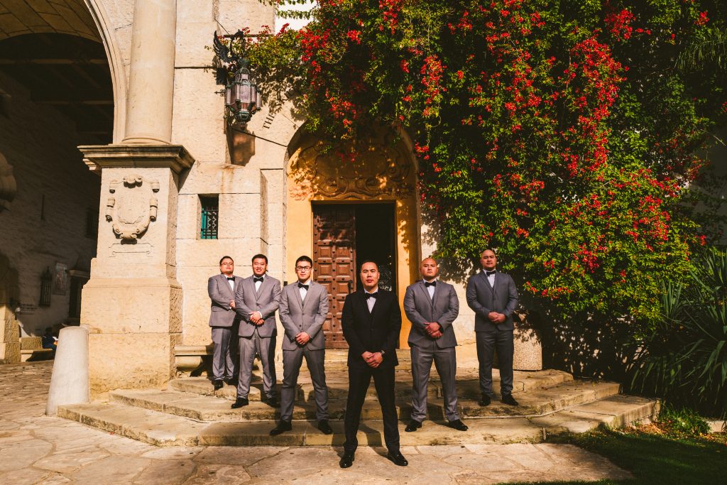 The groomsmen were all in a classic grey suit for this romantic wedding.