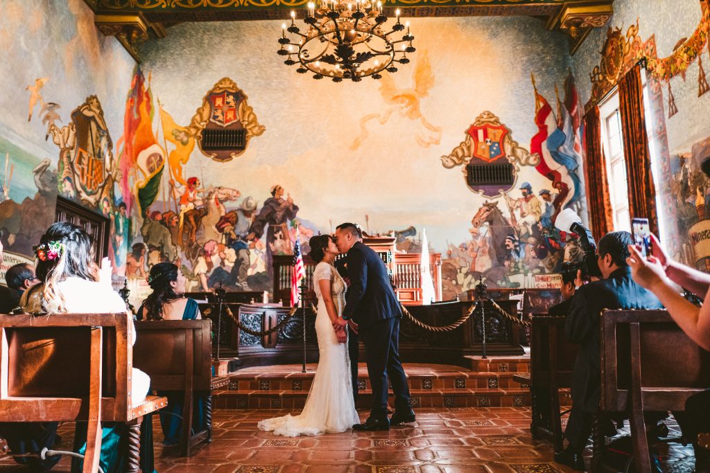 You may now kiss the bride! Gorgeous ceremony in the Mural Room.