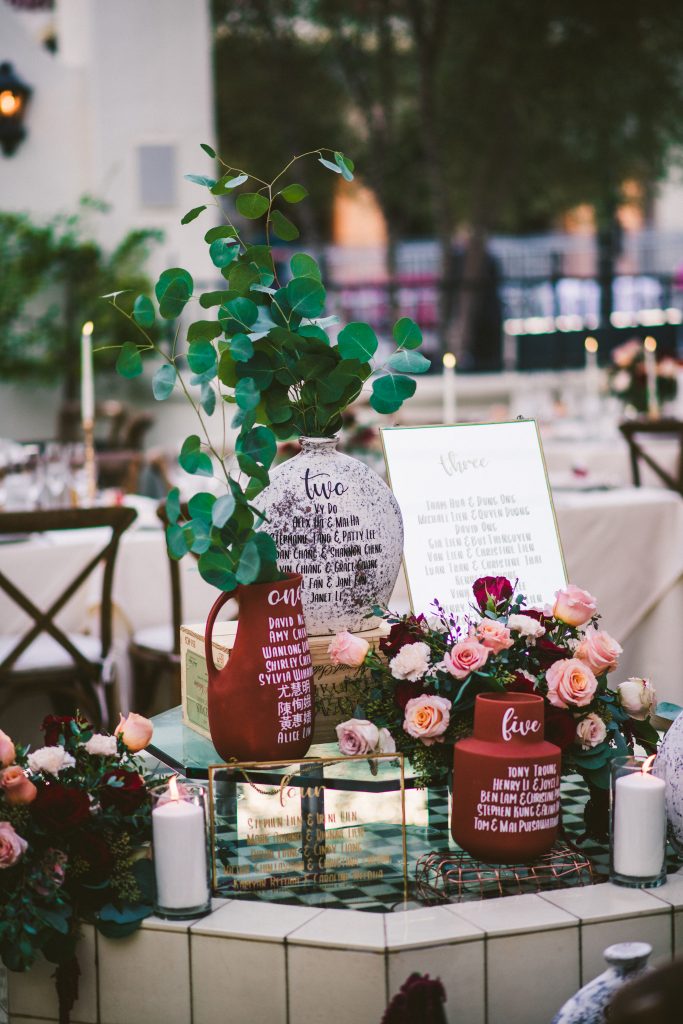 These beautiful vases were customized and used in place of a seating chart. A unique and gorgeous display!